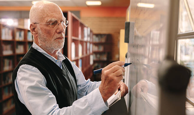 old professor teaching - Jacob Lund-AdobeStock cover