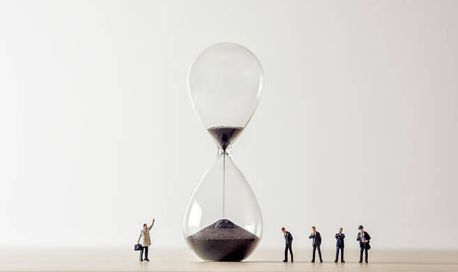 business people watching a sandglass - cover